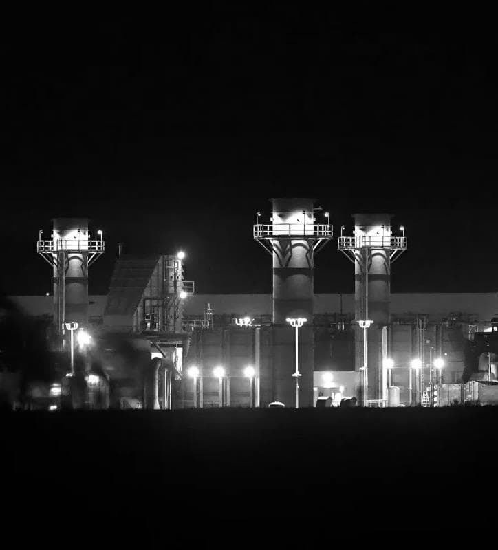 Industrial power infrastructure at night